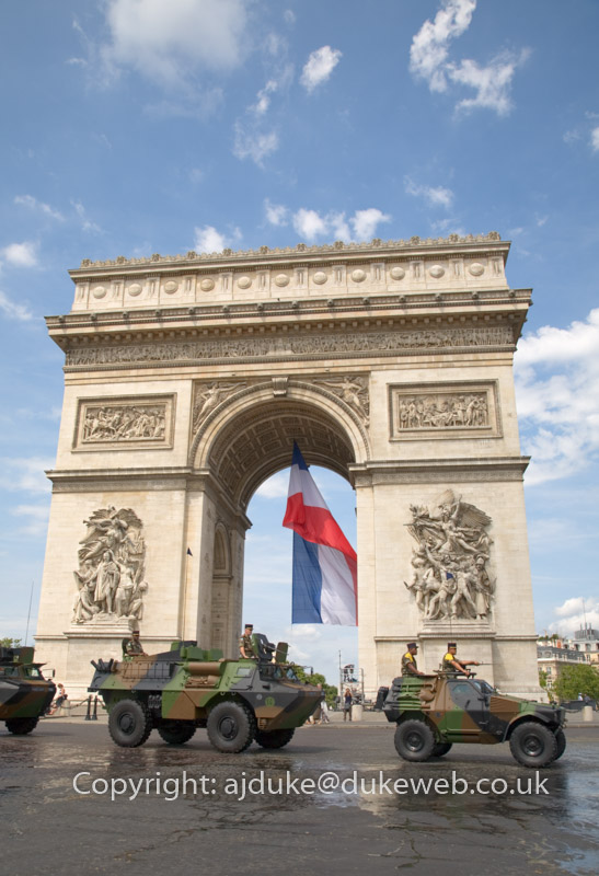 French Military vehicles driving past the Arc De Triomphe on Bastille day